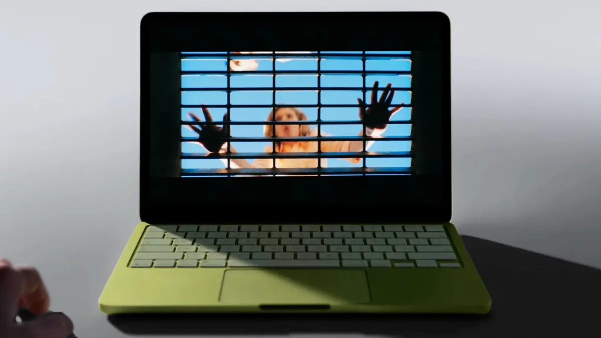 Detalhe do MacBook Neo 2 em uso com recursos de IA